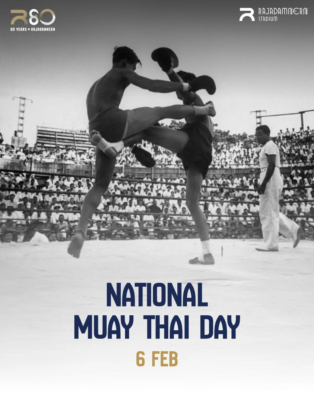 ภาพขาวดำนักมวยไทยสองคนออกเข่าบนเวทีมวยยุคเก่า ผู้ชมเต็มอัฒจันทร์ ข้อความ National Muay Thai Day 6 Feb